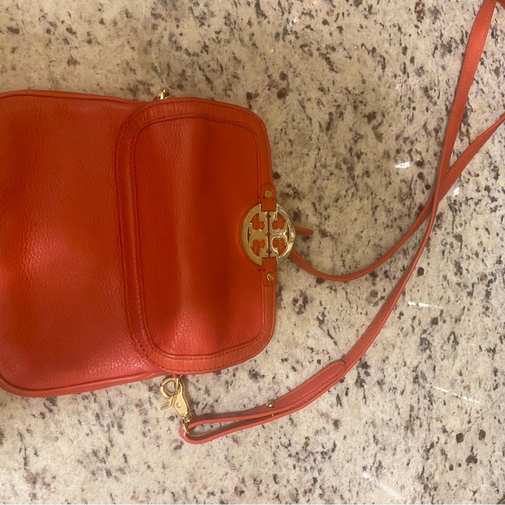 Red Tory Burch evening bag.